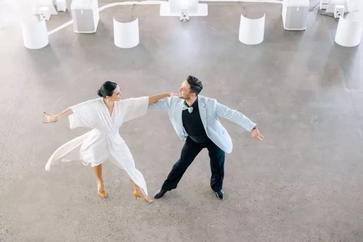 Dance couple practicing in a studio