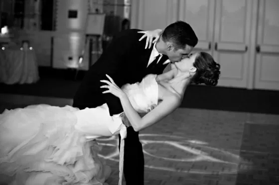 A newly married couple sharing their first dance